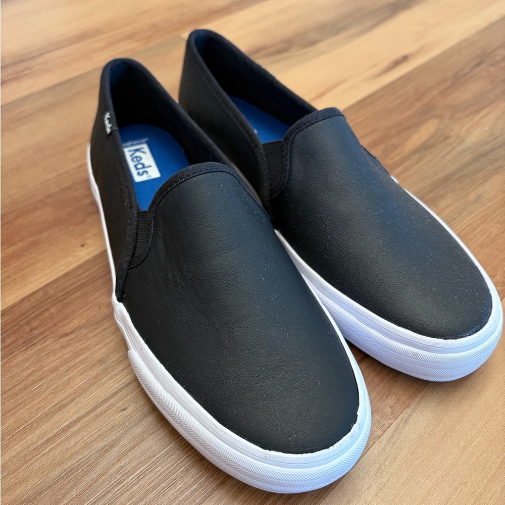Keds Black Leather Slip-On Sneakers with White Sole